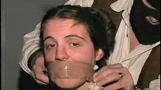 UK GIRL LISA IS MOUTH STUFFED,WRAP TAPE GAGGED & TOE TIED