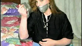 DOLL FACE APRIL TAPES UPS, GAGS & HANDCUFFS HERSELF