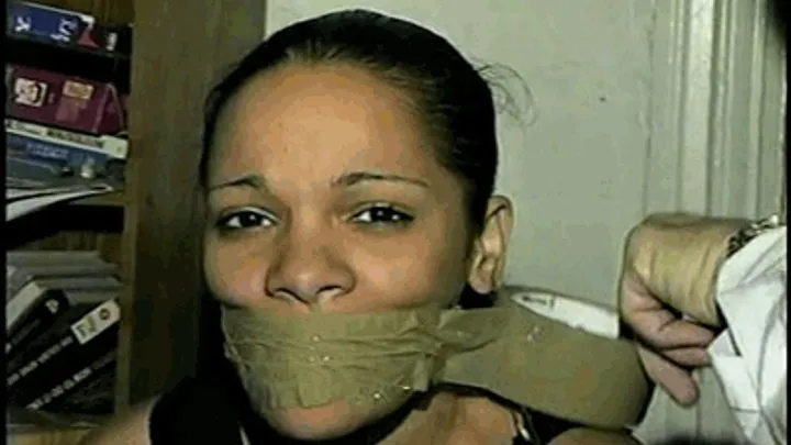 20 YR OLD LATINA IS WRAP AROUND TAPE GAGGED, MOUTH STUFFED AND BALL-TIED