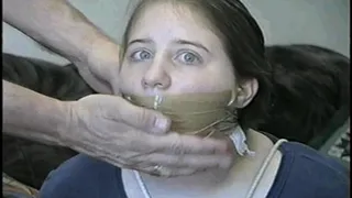 19 Yr OLD SCHOOL GIRL  IS MOUTH STUFFED, WRAP TAPE GAGGED, BAREFOOT & TOE TIED