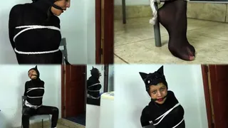 Chairtied ebony kitty