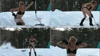 Veronica shoveling snow in a black bra and thong