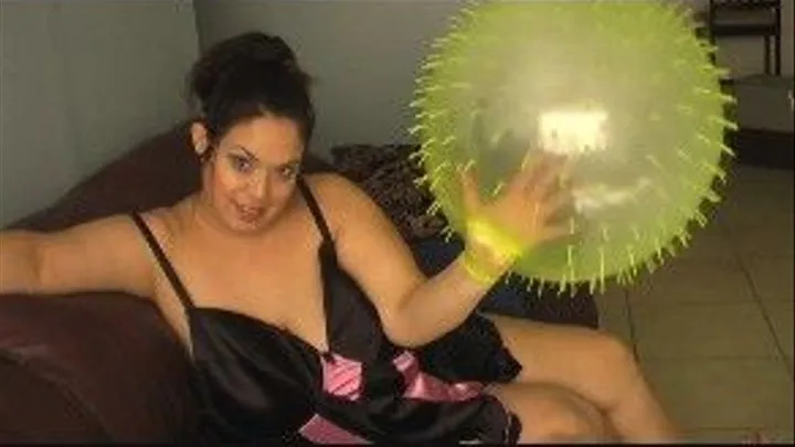 Rikki In Lingerie with her Hand Inside the Balloon