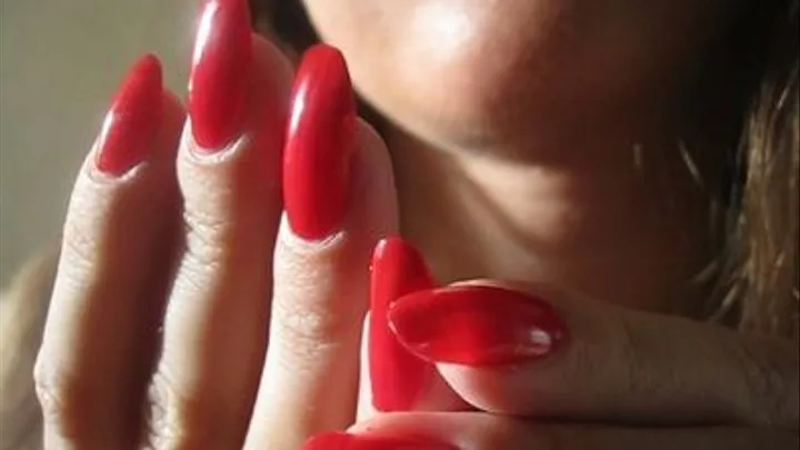 Shiny Red Nails In Close Ups