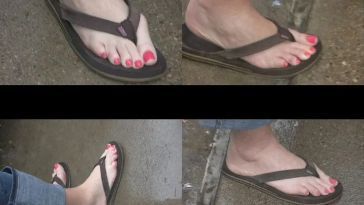 Brunette with Red Pedicure in Flip Flops