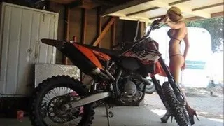 Revving KTM in Spiral Bikini