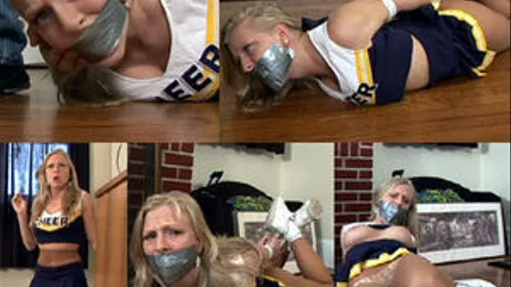 Busty Blond Cheer Leader tied up by a home invader.