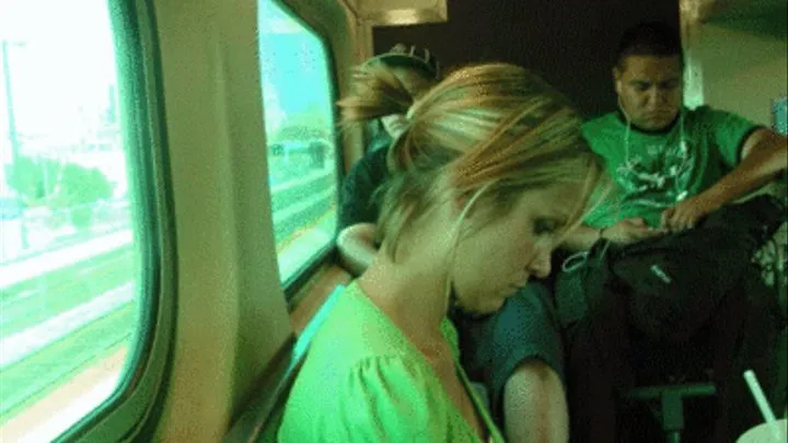 Candid blonde on train