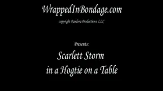 Scarlett Storm in a Hogtie on a Table