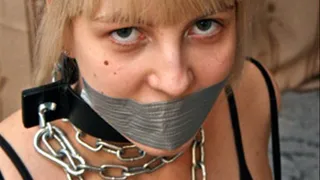 Anna: Chained To The HandCuff Post, Collared & TapeGagged
