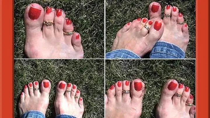 Pretty feet and toes play in the grass