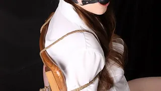 Ballgagged Amanda, wearing shirt, panties and black high heels, tied to chair with her legs bent and her feet tied to the seat, is desperately wiggling, trying to loosen her ropes