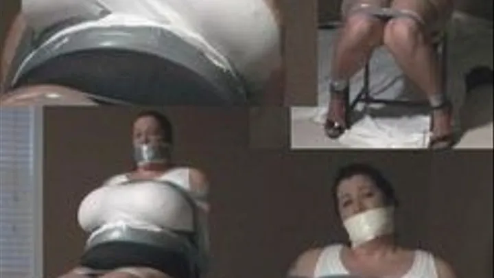 Mandy bound tight with duct tape