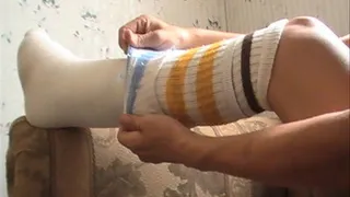 Removing The Tube Socks And Bandages