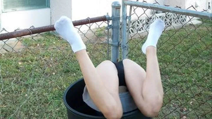 Staceys Stuck Upside Down In a Trashcan With Her Knickers Exposed For All Her Neighbors To See!