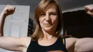 Flexing Her Biceps and punching you. pov