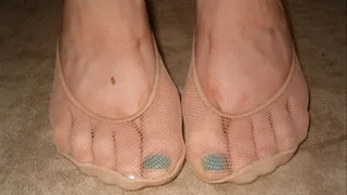 Feet In Pedi Socks