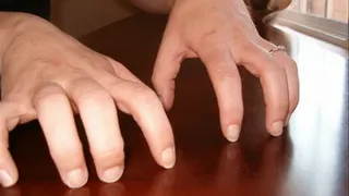 Taps Her Finger nails 1