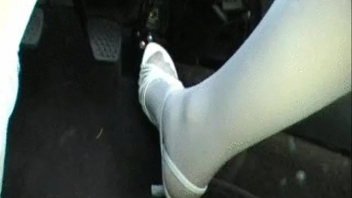 Jessica Punching the gas in White Stockings & Heels