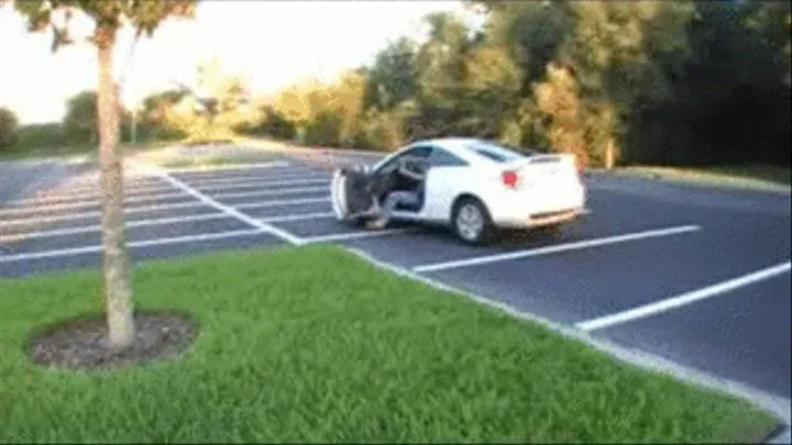 Aryana driving her white Toyota Celica