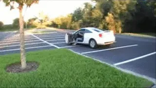 Aryana driving her white Toyota Celica