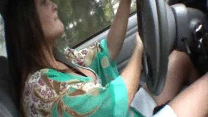 Sabrina driving in gold flip flops