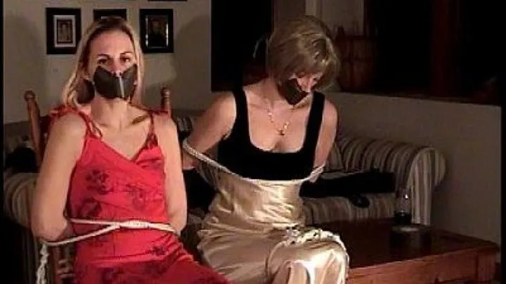 Coral & Ray- Two Girls Bound, Tape Gagged, Wearing Fancy Evening Gowns