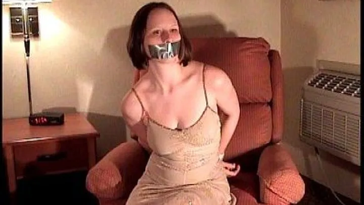 Pandora- Tied Up, Hard Rubber Ball Gag, Silver Duct Tape Gag