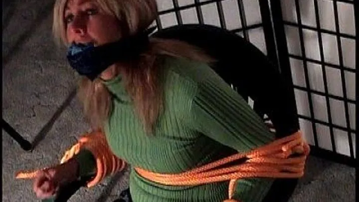 Dakkota- Chair Tied, Gagged With Packing And Bandana, Tight Jeans, Boots, Turtleneck