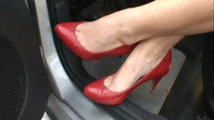 Jenna Drives in Hot Red Pumps