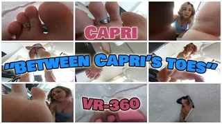 Between Capri's toes