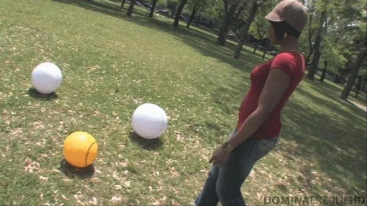 Bursting inflatables in public park (MOV )