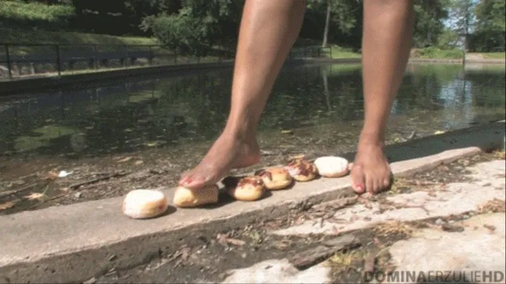 Crushing filled donuts with bare feet (MOV )