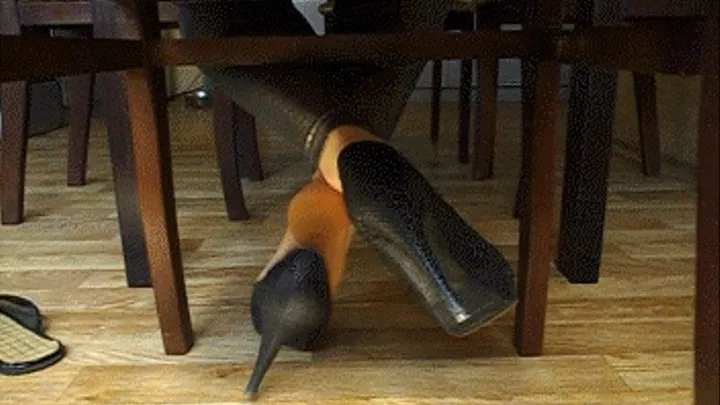 tired feet under the table ( shoes)