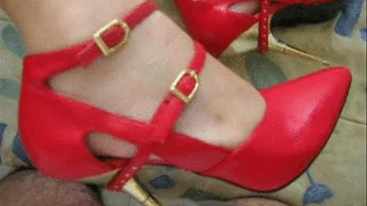 Heelsjob with Red Strappy metal spike heels