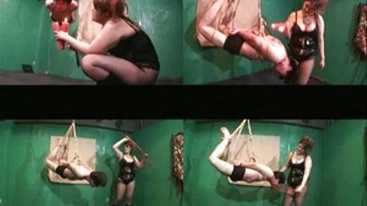 Domina Dangles Her Slave In Ropes Before Pouring Hot Wax On His Body And Whipping It Viciously