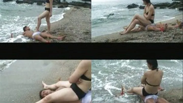 Mistress Sits On Slave's Stomach While On The Shore!