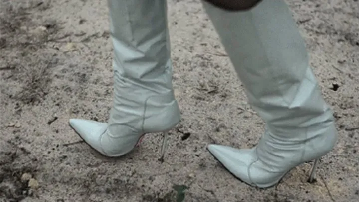 Sand walking in knee high boots