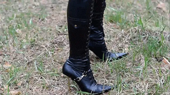 Metal heels boots in the forest