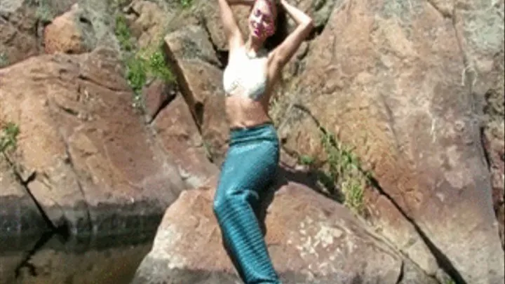 Mermaid Maggie on a river