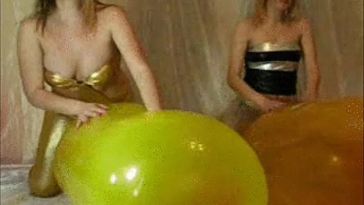 2 blondes riding giant balloons -LQ