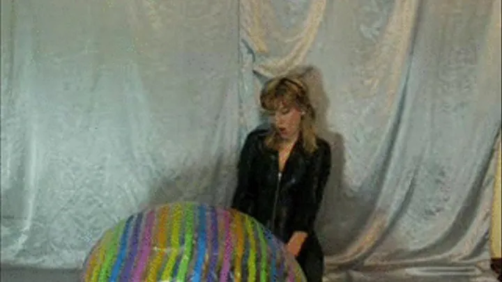 Alina in Catsuit rides beachball -LQ