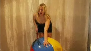 Christina in Latexdress rides and deflates beachball -LQ