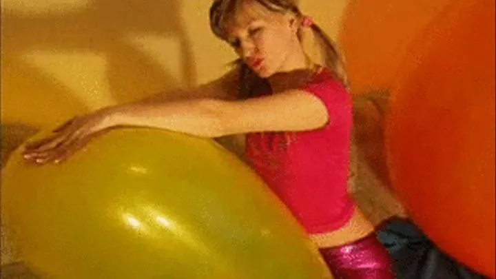 Alina riding on a giant balloon and makes a striptease