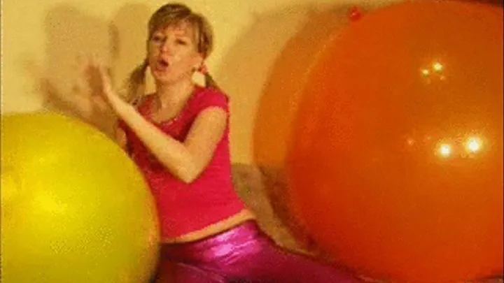 Alina riding on a giant balloon in Spandex 1