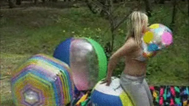 Christina plays outdoor with beachballs -LQ