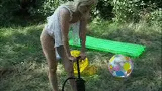 2 blondes riding beachballs -LQ