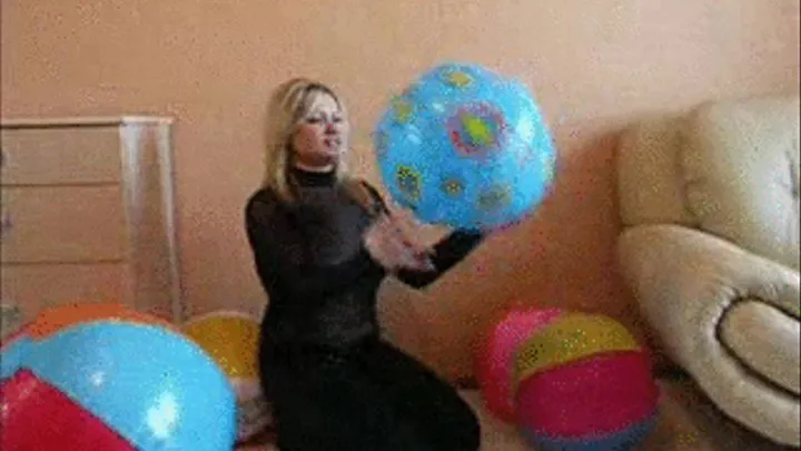 Christina in Jeans pops a beachball -LQ