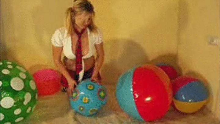 Christina as a schollgirl plays with beachballs -LQ