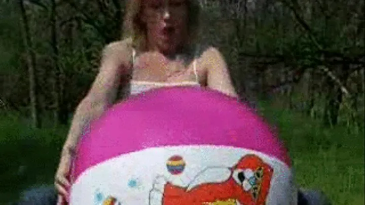 Alina pops beachball in the forrest